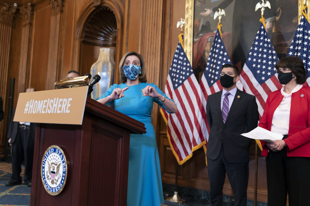 Nancy Pelosi, Raul Ruiz, Lucille Roybal-Allard Speaker of the House Nancy Pelosi, D-Calif., joined at right by Rep. Raul Ruiz, D-Calif., chairman of the House Hispanic Caucus, and Rep. Lucille Roybal-Allard, D-Calif.,
discusses the upcoming vote on the American Dream and Promise Act of 2021, a bill to help reform the immigration system, at the Capitol in Washington, Thursday, March 18, 2021. (AP Photo/J. Scott Applewhite)