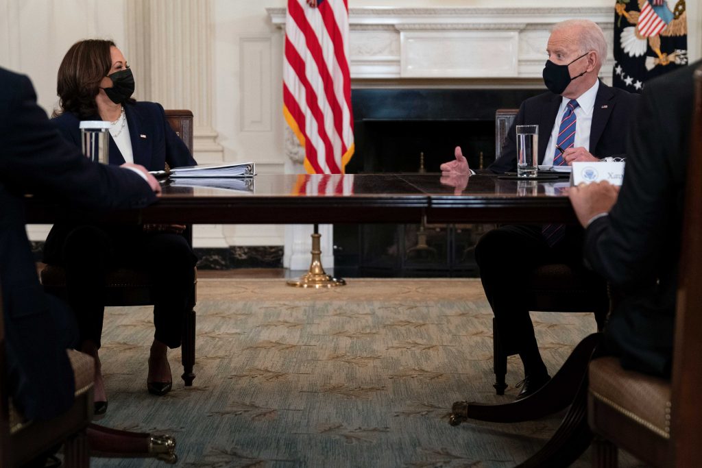 Kamala Harris,Joe Biden President Joe Biden speaks with Vice President Kamala Harris about the southern border during a meeting in the State Dining Room of the White House, Wednesday, March 24, 2021, in Washington. (AP Photo/Evan Vucci)