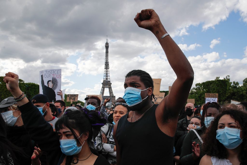 George Floyd Officer Trial Whats Changed In this June 6, 2020, file photo, hundreds of demonstrators gather on the Champs de Mars as the Eiffel Tower is seen in the background during a demonstration in Paris to protest against the recent killing of George Floyd. (AP Photo/Francois Mori)
