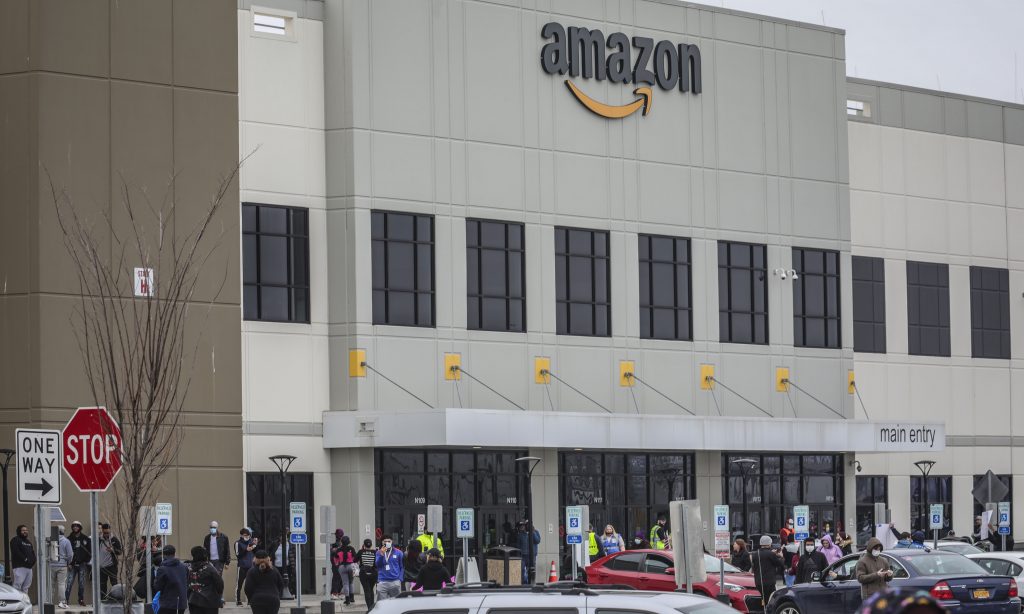 Amazon Workers at Amazon's fulfillment center in Staten Island, N.Y., gather outside to protest work condition