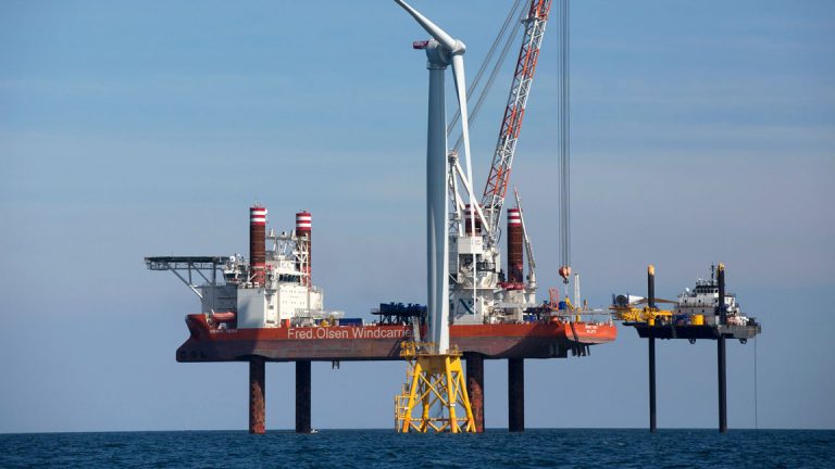 Aug. 15, 2016, a wind turbine, front, being assembled off Block Island, Rhode Island. (Michael Dwyer/AP Photo)
