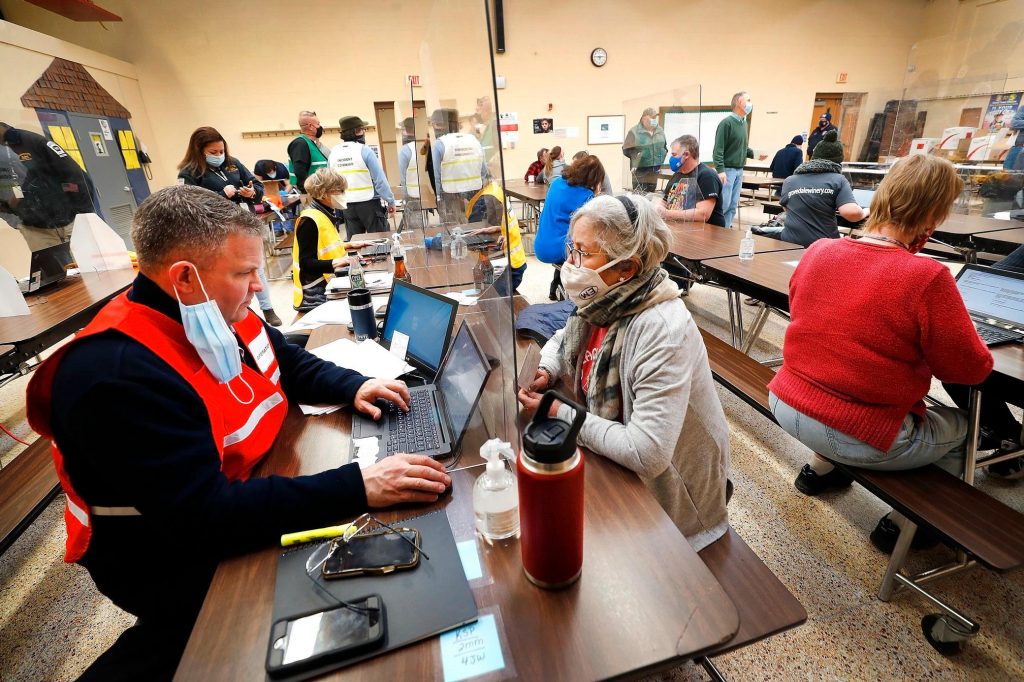 PA_coronavirus_vaccine_signup_FA_SPA_032921 Residents move through a Pa. vaccine clinic