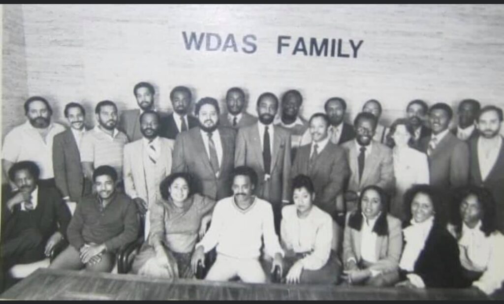 WDAS photo Tony Brown sits in the front row fourth from the left with Dyana Williams to his immediate left. Cody Anderson stands immediately behind Brown. Jerry Wells sits third from the right.