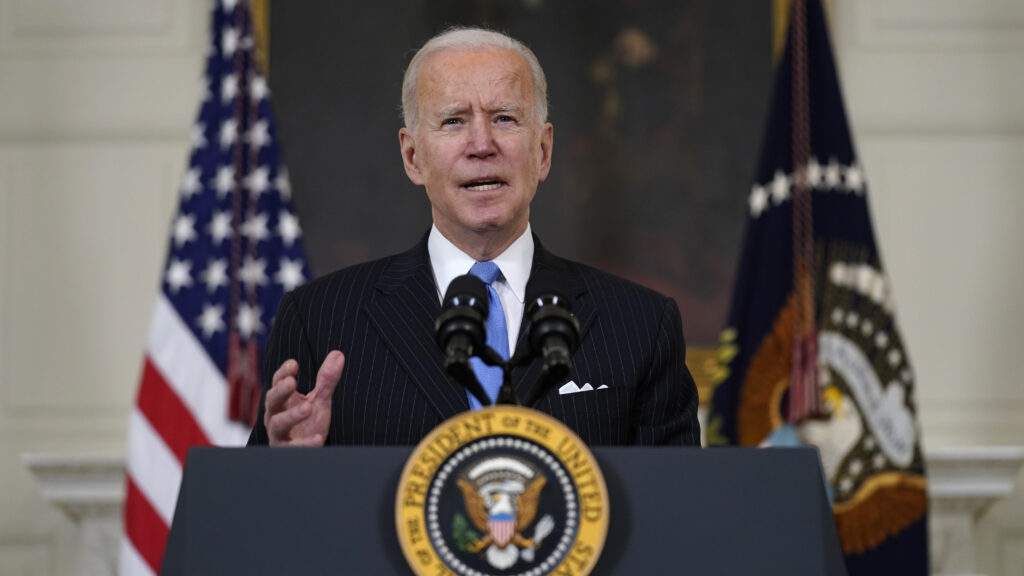 President Biden speaks at the White House about efforts to combat COVID-19 on Tuesday. (Evan Vucci/AP)
