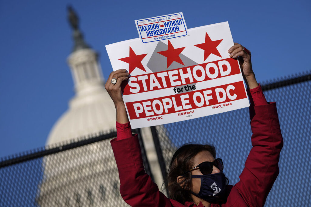 Local Residents Rally For DC Statehood As House Considers Act Residents of the District of Columbia rally for statehood near the U.S. Capitol