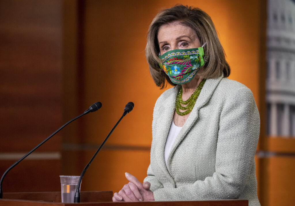Speaker Pelosi Holds Weekly Press Conference On Capitol Hill House Speaker Nancy addresses reporters from a podium