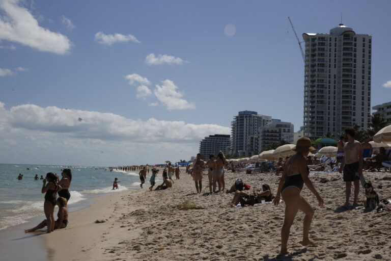 People flock to Miami Beach