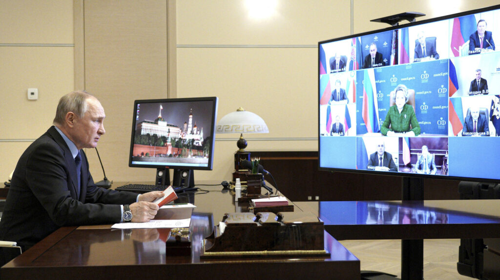 Russia Putin Russian President Vladimir Putin looks on at a Zoom meeting