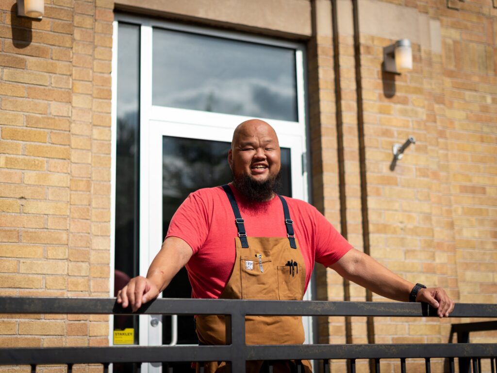 Chef Yia Vang’s restaurant in Minneapolis is getting ready to open amid a fierce debate within the restaurant industry about the minimum wage. The restaurant will ban tipping. Chef Yia Vang's restaurant in Minneapolis is getting ready to open amid a fierce debate within the restaurant industry about the minimum wage. The restaurant will ban tipping.