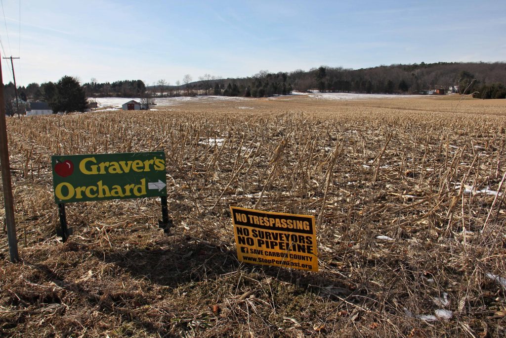 The proposed PennEast pipeline would pass through the fields of the Christman farm, seen from the intersection of Station Street and Pohopoco Drive in Lehighton. (Emma Lee/WHYY)