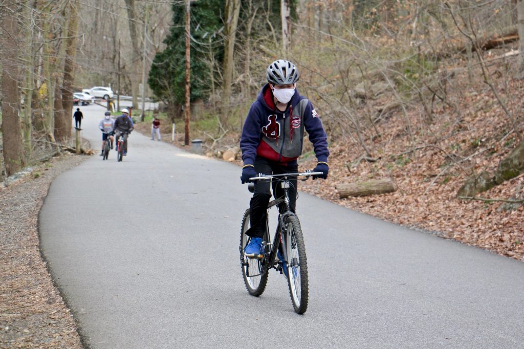 2021 04 01-e lee-delaware county ridley creek state park bicyclist Bicyclists take advantage of the multi-use trail at Ridley State Park in Media, Pa. (Emma Lee/WHYY)