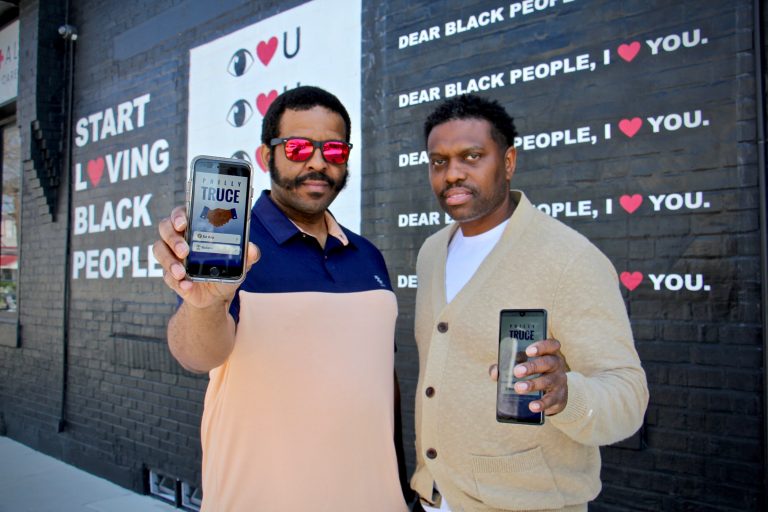 Longtime friends Mazzie Casher (left) and Steven Pickens created the Philly Truce app, aimed at mediating neighborhood disputes before theuy erupt in violence. (Emma Lee/WHYY)