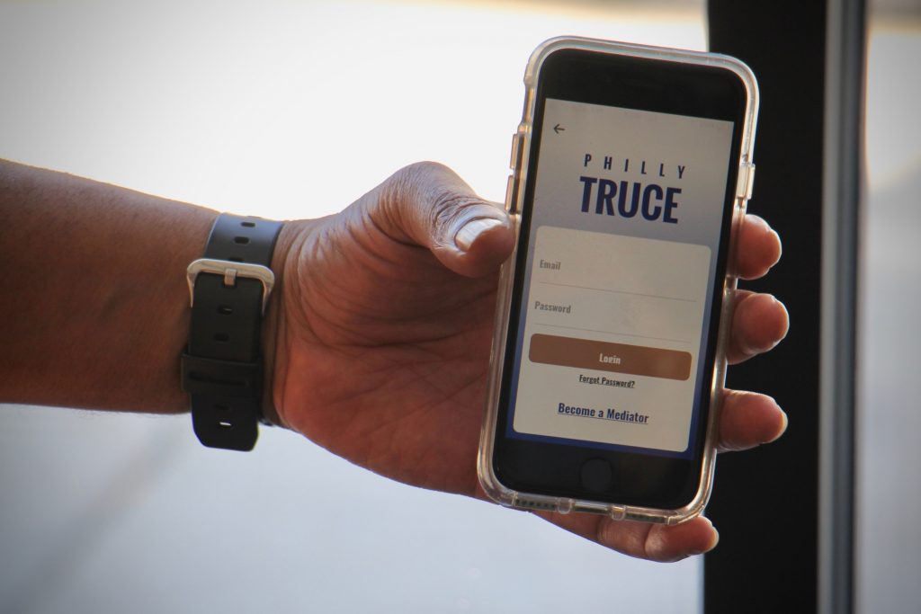 2021 04 05-e lee-philadelphia-philly truce app Philly Truce is an app that connects troubled neighborhoods with trained mediators who can calm disputes before they erupt in violence. (Emma Lee/WHYY)