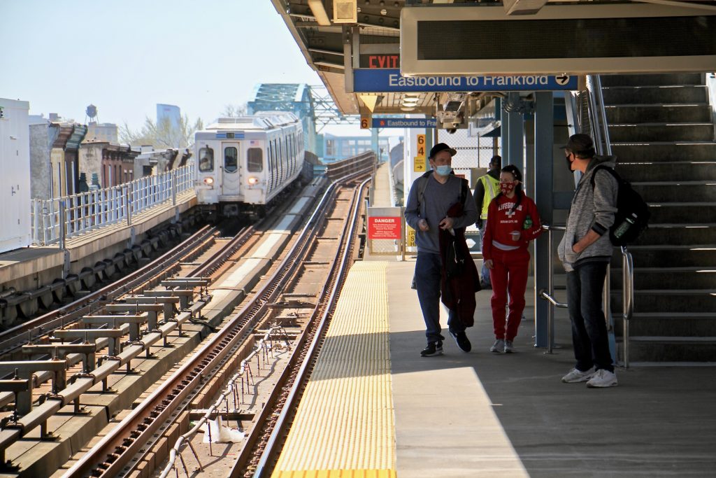 2021 04 05-e lee-philadelphia somerset station septa market frankford-platform Passengers wait at the Somerset Statio