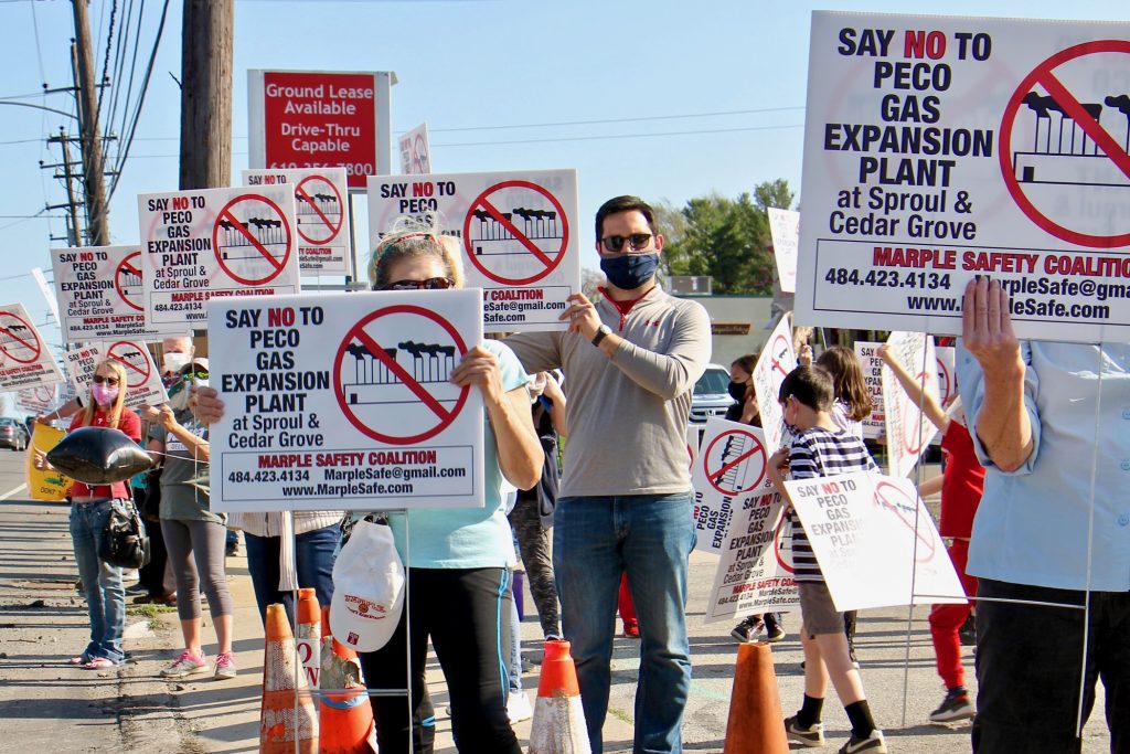 2021 04 08-e lee-greg fat-marple township pa sproul and cedar grove roads-natural gas expansion plant protest Greg Fat (center), a leader of Marple Safety Coalition, joins protesters at the intersection of Sproul and Cedar Grove roads in Marple Township, Pa, where PECO wants to build a natural gas expansion plant. (Emma Lee/WHYY)