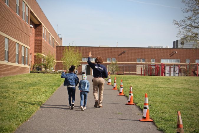 Students are escorted to H.B. Wilson Elementary School