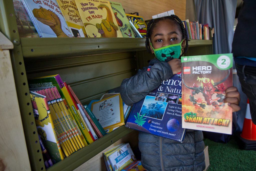 2021-04-7-k-paynter-treehouse-books-free-books-5 Six-year-old Melvin chose two books from Treehouse Books’ mobile library