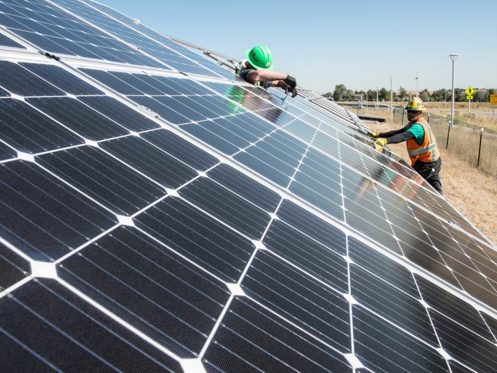 To cut carbon emissions, President Biden announced an initiative to further cut the cost of solar installations, like this one being tested at the National Renewable Energy Laboratory in Colorado. To cut carbon emissions, President Biden announced an initiative to further cut the cost of solar installations, like this one being tested at the National Renewable Energy Laboratory in Colorado. (Dennis Schroeder/NREL)