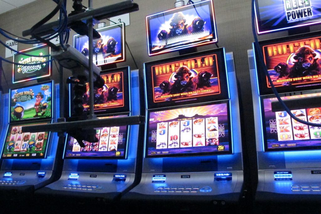 Virus Outbreak-Gambling Expansion This Feb. 10, 2020 photo shows slot machines at the Hard Rock casino in Atlantic City, N.J. that are controlled by gamblers over the internet. (AP Photo/Wayne Parry)