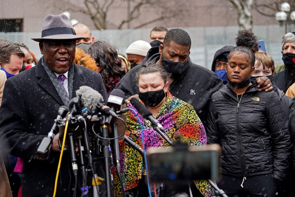 Katie Wright,Ben Crump Katie Wright, center, the mother of Daunte Wright, and other family and friends gather during a news conference Tuesday, April 13, 2021, in Minneapolis as family attorney Ben Crump, left, speaks. Daunte Wright, 20, was shot and killed by police Sunday after a traffic stop in Brooklyn Center, Minn. (AP Photo/Jim Mone)