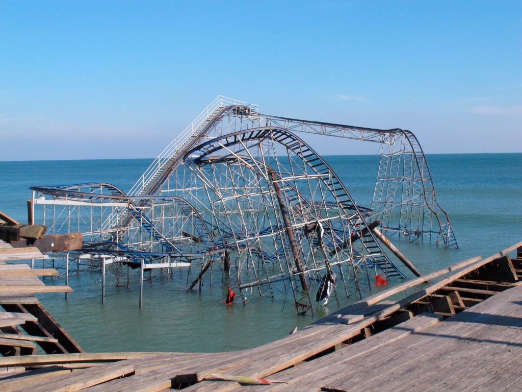 NJ Climate Change Resiliency NJ This Nov. 29, 2012 file photo shows the Jet Star roller coaster sitting in the ocean in Seaside Heights N.J. one month after Superstorm Sandy knocked it off Casino Pier into the water. (AP Photo/Wayne Parry)
