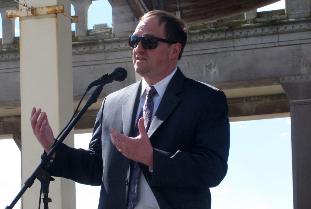 Virus Outbreak-Atlantic City Michael Chait, president of the Greater Atlantic City Chamber of Commerce, speaks at a press conference on the Atlantic City, N.J. Boardwalk on April 30, 2021 at which he and other business and political officials called on New Jersey Gov. Phil Murphy to ease coronavirus restrictions enough to allow conventions and trade shows to resume in Atlantic City. (AP Photo/Wayne Parry)