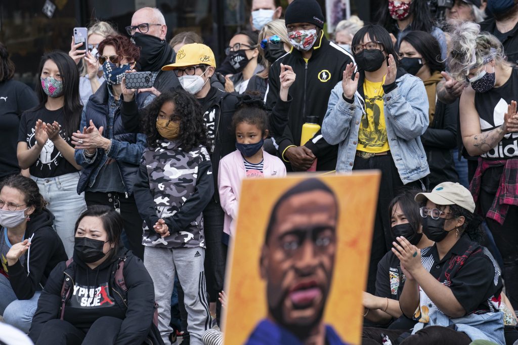 Demonstrators gather for a solidarity rally in memory of George Floyd and Daunte Wright outside Cup Foods