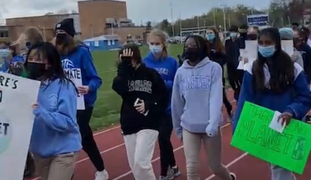 Charter GREEN Charter School of Wilmington students march following an Earth Day rally in support of a Green Amendment to Delaware's Constitution.