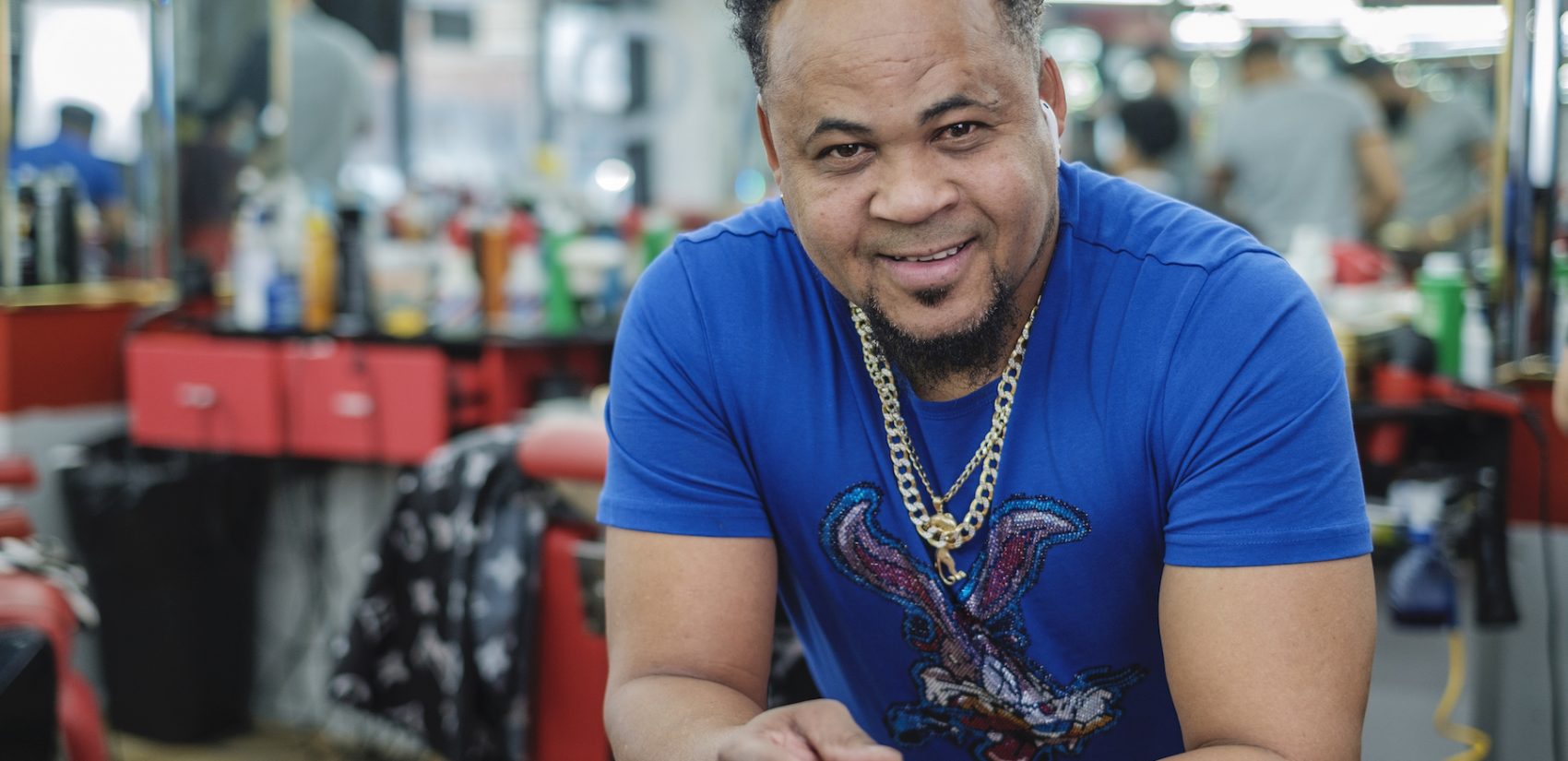 Raymon “La Salsa” Rincón was able to open up his shop with the support of a friend — now we works to help members of his team who want to go solo too. | Raymon “La Salsa” Rincón pudo abrir su tienda con el apoyo de un amigo - ahora el también ayuda a los miembros de su equipo que también quieren abrir sus propias tiendas. (Photo by Bernardo Morillo/WHYY)