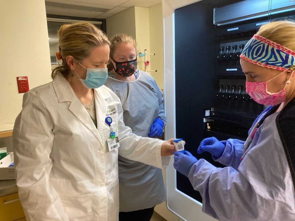 IMG_9463 From left, Dr. Marci Drees reviews respiratory samples with scientists Alexa Pierce-Matlack and Stephanie Levin at Christiana Hospital's microbiology laboratory. (Courtesy of Christiana Care)