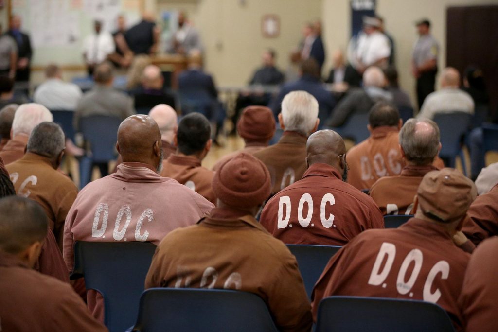PA_DOC_prison_incarcerated_SPA_040821 People who are incarcerated in a Pennsylvania prison sit inside while wearing DOC uniforms