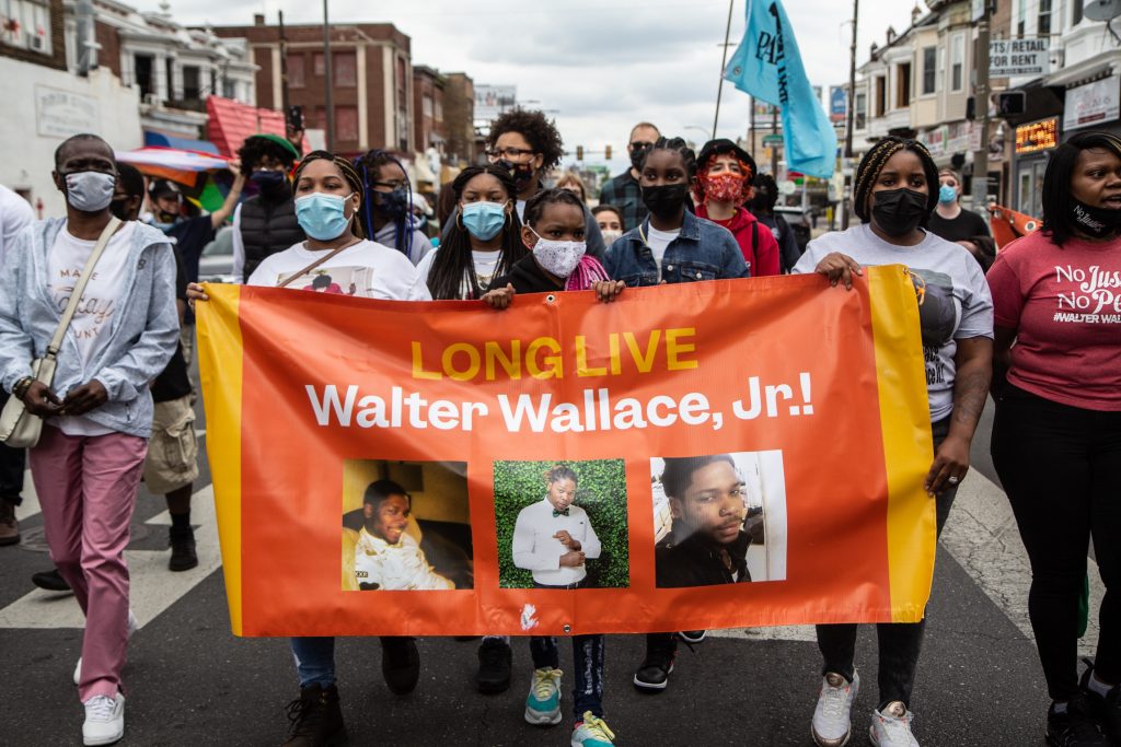 WWJ_protest_philly_KP_042521_02 Protesters carry a banner in honor of Walter Wallace Jr.