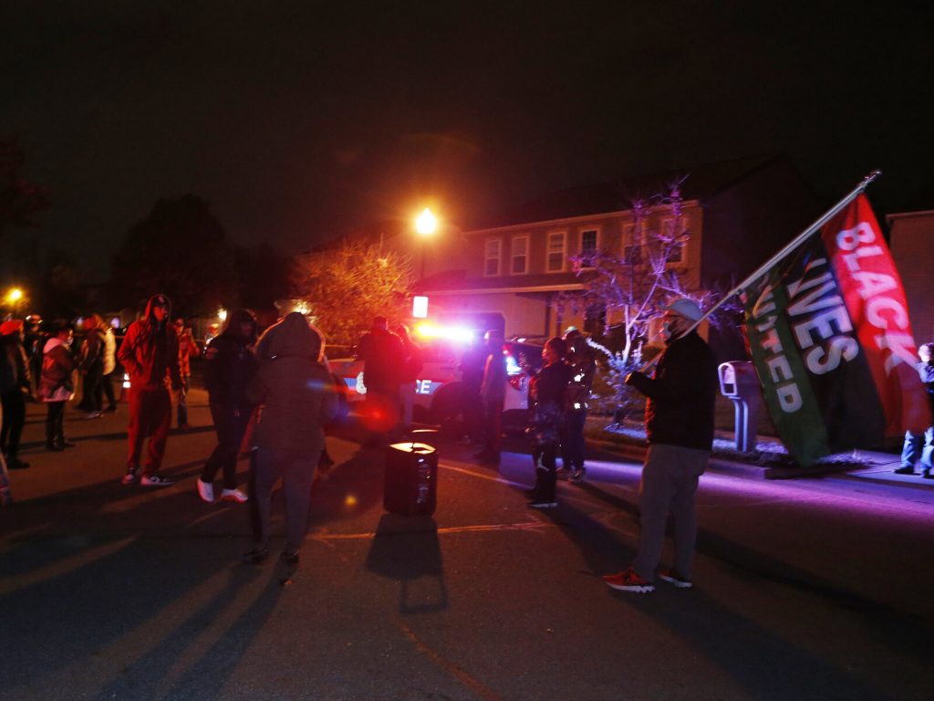 Columbus Police Shooting A crowd gathers to protest in the neighborhood where a Columbus police officer fatally shot a Black teenage girl