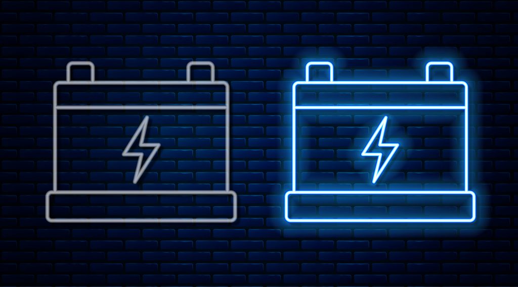bigstock-Glowing-Neon-Line-Car-Battery–415265743-web Glowing neon line Car battery icon isolated on brick wall background