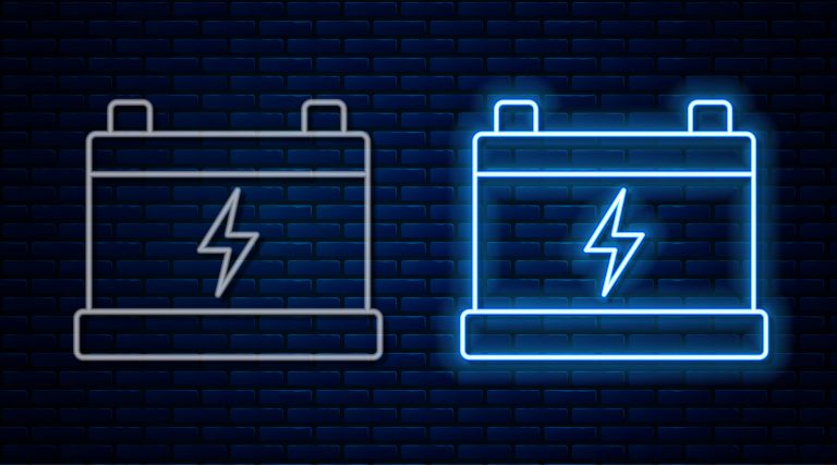 Glowing neon line Car battery icon isolated on brick wall background