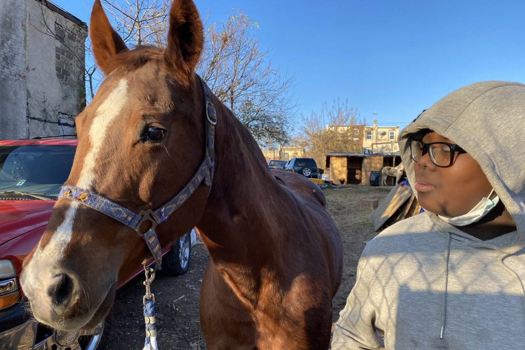 fletcherstreetstables-dhenninger-01 Nahye Hyman stands next to a horse