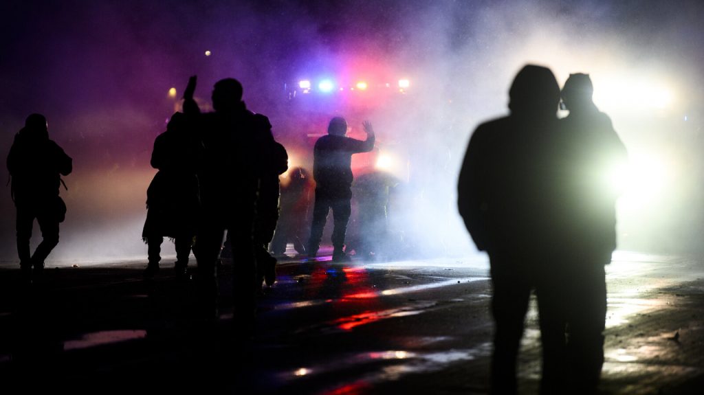 Demonstrators protest the fatal shooting of 20-year-old Daunte Wright by a police officer.