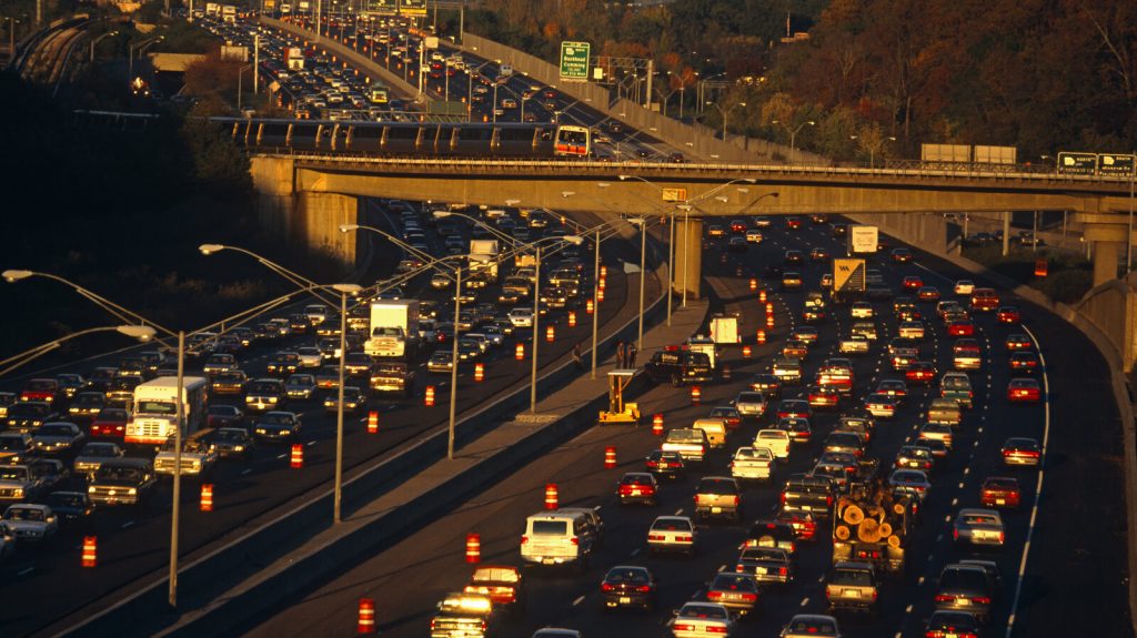 USA – Atlanta – Slow commuter traffic on the interstate Near the junction of the 400 to Buckhead, the 401 highway divides and splits during afternoon rush-hour traffic.