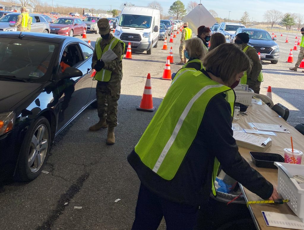 mary-kampman-wideline Medical Reserve Corps members work with the National Guard and state public health employees in giving vaccinations at Delaware's mass events, like this one at Dover International Speedway. (Courtesy of Mary Kampman)