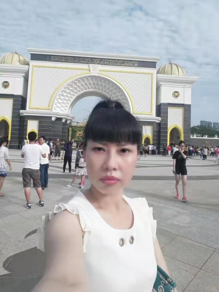 A selfie Feng Daoyou took in Macau. Her older brother Feng Daokun believes she traveled to Hong Kong before flying to the U.S., from where she first contacted him in 2016. Unlike the rest of her family, she did not marry, and seemed to relish venturing far from home. “She could do anything she put her mind to. She was tough. She never gave up. That was just her personality,” her brother says. A selfie Feng Daoyou took in Macau. Her older brother Feng Daokun believes she traveled to Hong Kong before flying to the U.S., from where she first contacted him in 2016. Unlike the rest of her family, she did not marry, and seemed to relish venturing far from home.