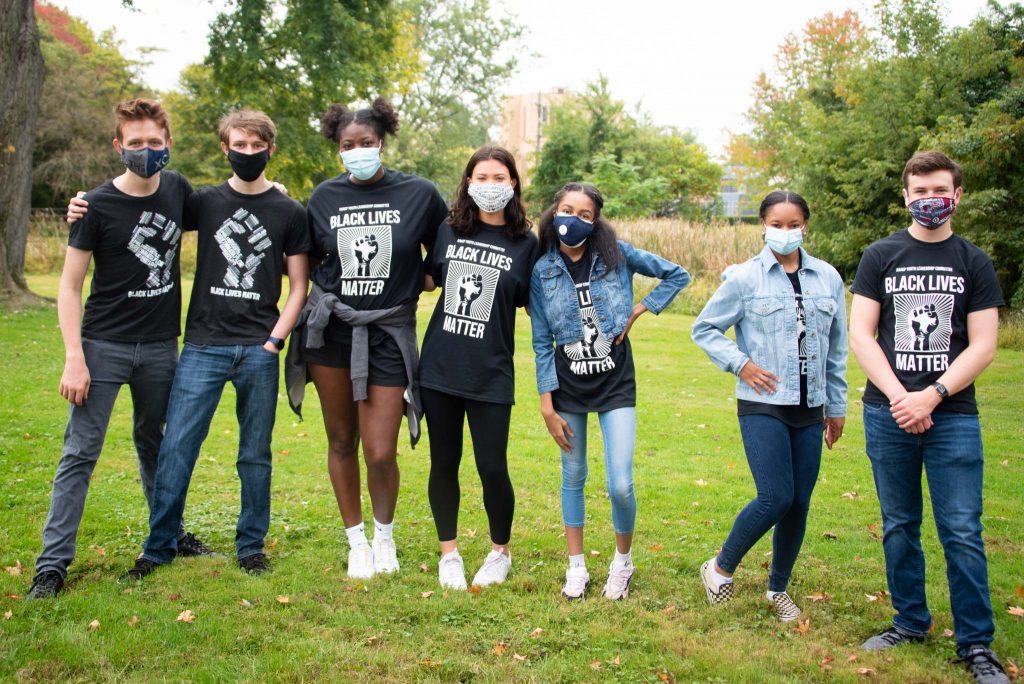 08KCNAACP Springfield Township High School students, Paris Thompson (third from left), Gabrielle Greene (third from right) and Candace Harrison (second from right), along with other members of the Cheltenham Branch NAACP Youth Leadership Committee attend a Breonna Taylor rally. (Courtesy of Liza Meiris)