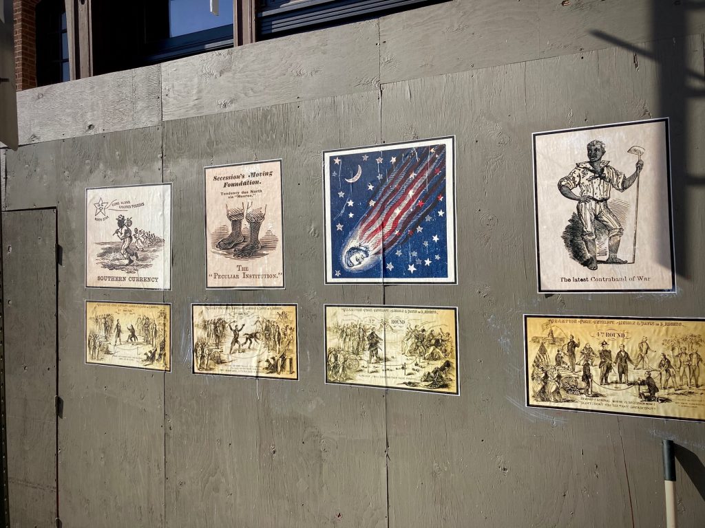 An exhibit of Civil War Era images displayed on a construction wall at 3rd and Chestut streets was quickly taken down by the Old City District. It was perceived as a hate crime. (Courtesy of Todd Kimmell)