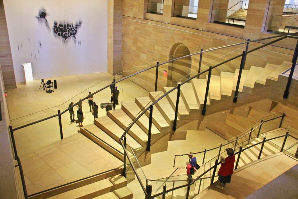 A suspended stairway leads to the Williams Forum