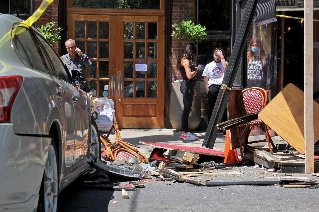 2021 05 12-e lee-philadelphia northern liberties cafe la maude-outdoor dining crash A car crashed into an outdoor dining structure on 4th Street in Northern Liberties, injuring several patrons at Cafe La Maude. (Emma Lee/WHYY)