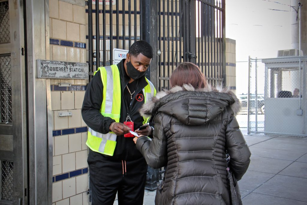 2021 05 13-e lee-kenneth harris-philadelphia somerset station-homeless outreach Outreach worker Kenneth Harris engages with a client outside Somerset Station. (Emma Lee/WHYY)