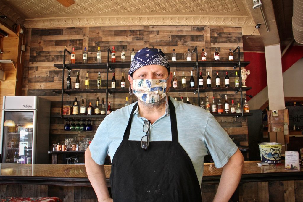 2021 05 18-elee-bordentown nj farnsworth avenue jesters cafe-restrictions lifting Mike Scotto wears a mask inside Jester's Cafe