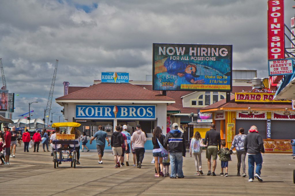 2021-05-31-k-paynter-wildwood-memorial-day-2021-9 Morey’s Pier on the Wildwood Boardwalk advertises $15 an hour jobs on May 31, 2021, Memorial Day. (Kimberly Paynter/WHYY)