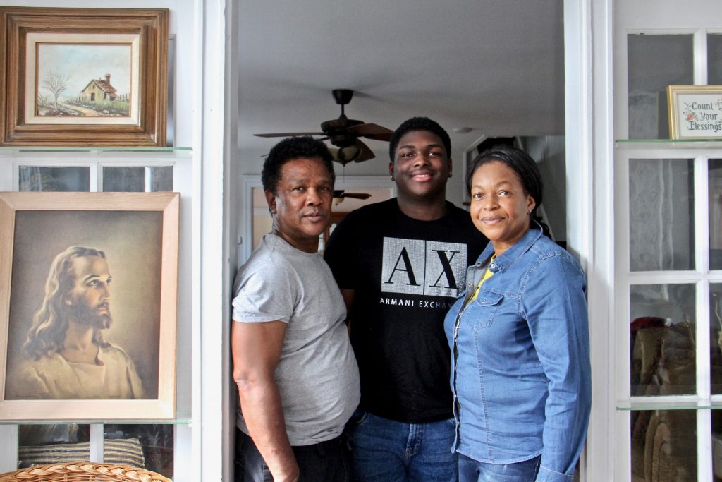 202105 04-e lee-clive thompson timothy thompson oneita thompson-philadelphia-out of sanctuary Clive and Oneita Thompson, with their son, Timothy, inside their West Philly home