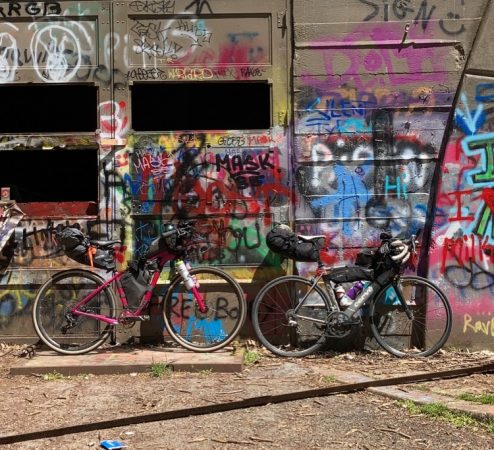 Bikes are pictured along an abandoned turnpike