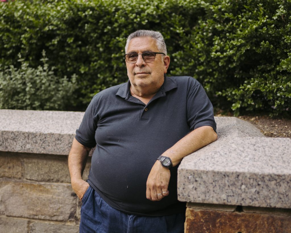 210518_drmass_001_custom-e33485a677d0d7a83325f510233a4f3dcf2dd709-s1600-c85 Dr. Lawrence Mass stands for a portrait outside